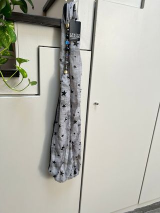 Sciarpa Coveri Collection con gioielli