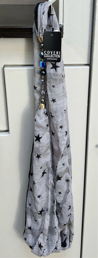 Sciarpa Coveri Collection con gioielli