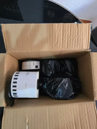 Impresora de etiquetas BrotherQL-700 + 9 repuestos