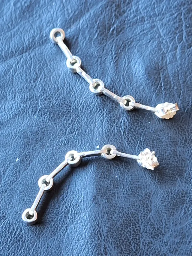 Pendientes articulados de plata 925 con circonitas