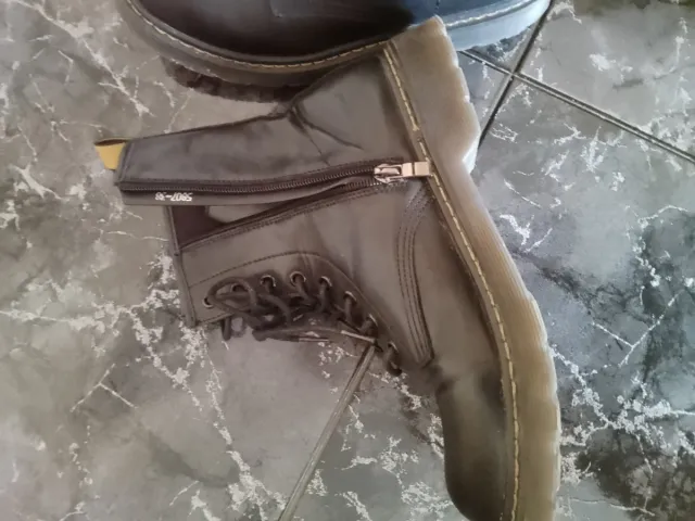 Botas de cuero con cremallera y cordones