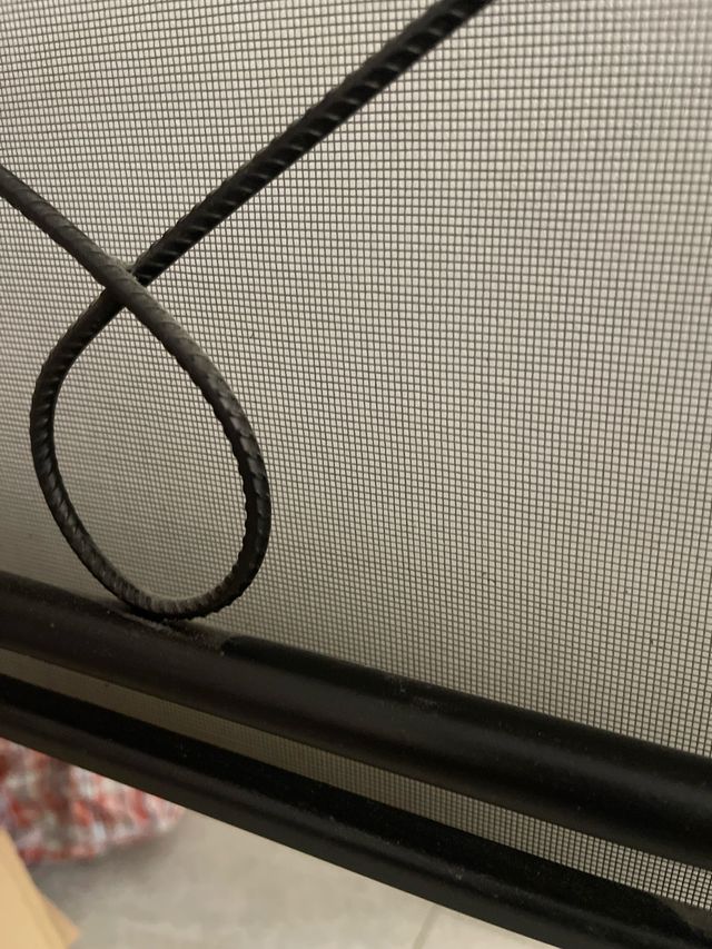 Espejo forja negro con detalle decorativo