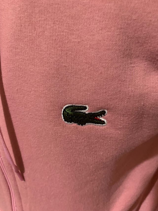 Sudadera rosa con cremallera y logo