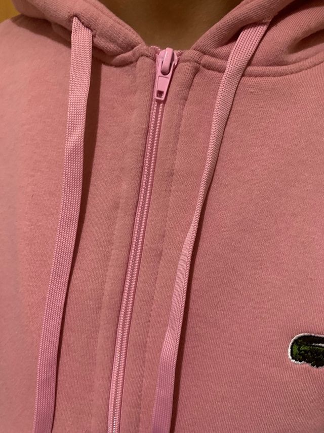 Sudadera rosa con cremallera y logo