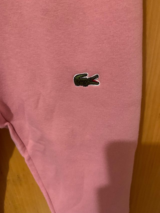 Sudadera rosa con cremallera y logo