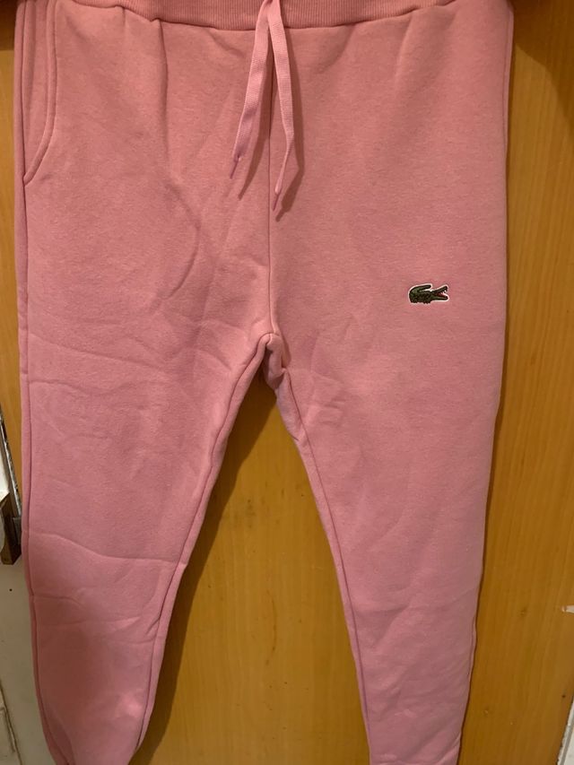 Sudadera rosa con cremallera y logo