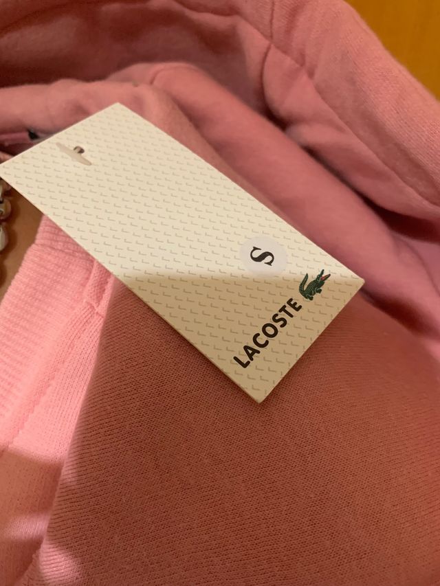 Sudadera rosa con cremallera y logo