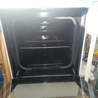 Cocina-horno Rommer 3 fuegos más campana