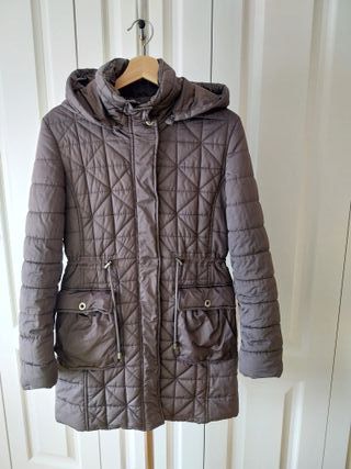 Plumas mujer marrón,