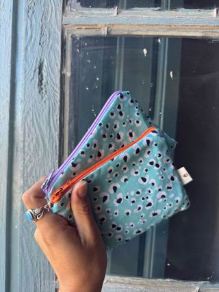 Cartera con estampado animal print