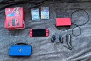 Nintendo Switch OLED Roja impoluta+ Juegos