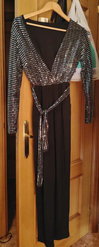 Mono de fiesta lentejuelas negro.