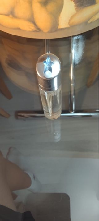 Colonia con estrella azul y plateada