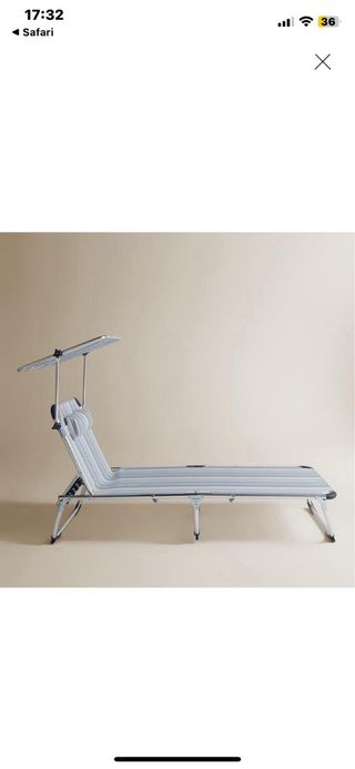 Tumbona plegable con parasol