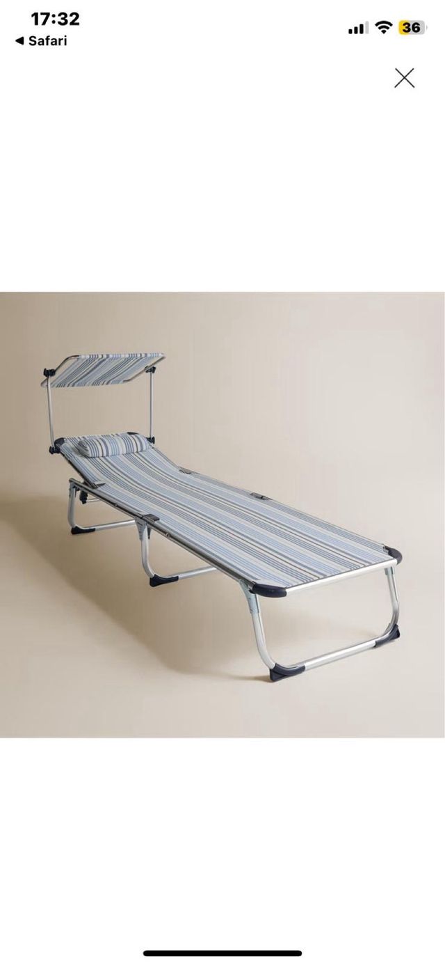 Tumbona plegable con parasol