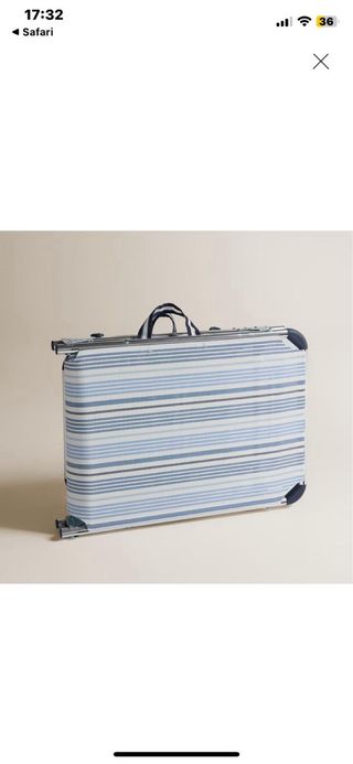 Tumbona plegable con parasol