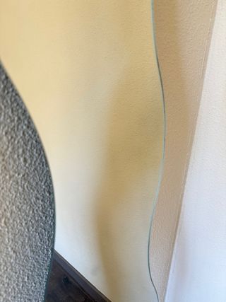 Espejo ondulado de cristal