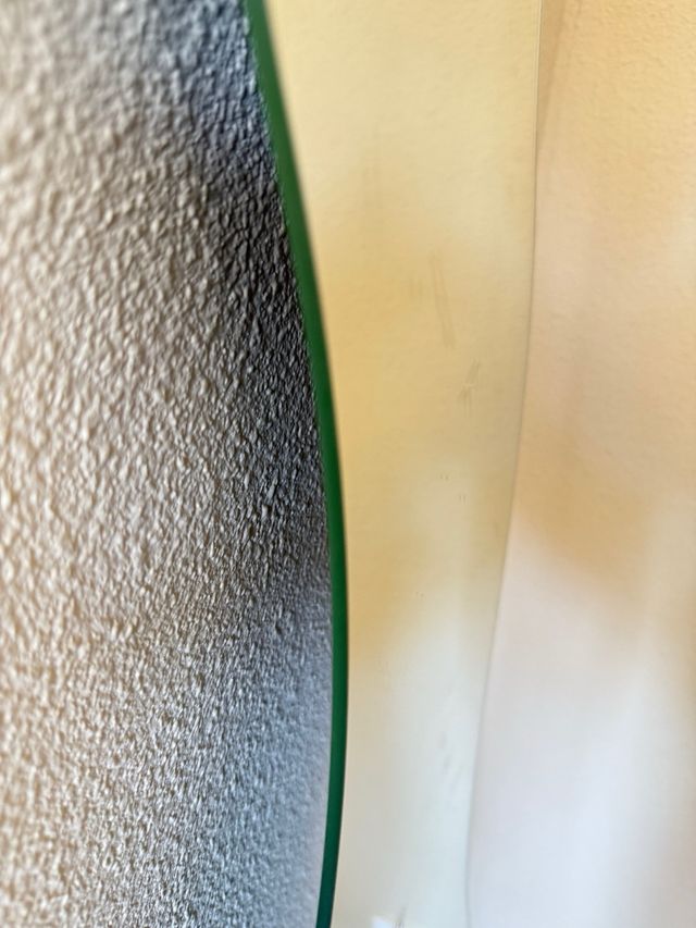 Espejo ondulado de cristal