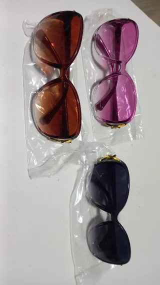 3 paia occhiali da sole