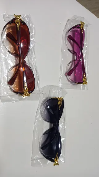 3 paia occhiali da sole