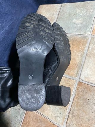 Stivali neri in pelle con fibbia