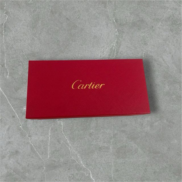 gafas Cartier marrón y doradas