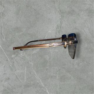 gafas Cartier marrón y doradas