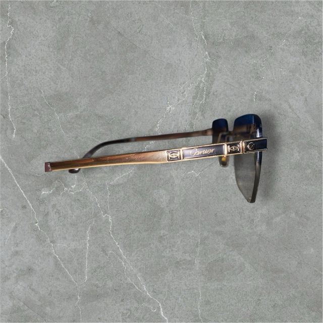 gafas Cartier marrón y doradas