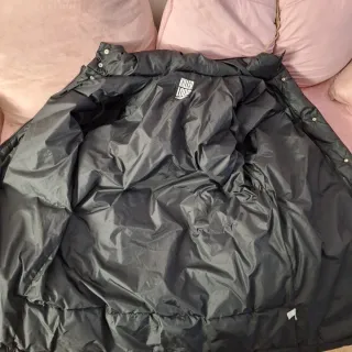 Piumino uomo nero con cappuccio