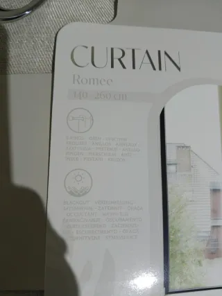 Cortinas beige de tela nuevas