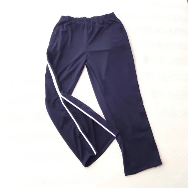 Pantalón chándal azul con cremallera