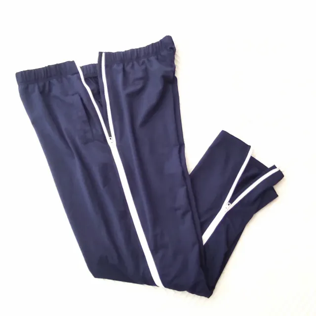 Pantalón chándal azul con cremallera