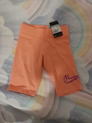 Mayas cortas Nike naranjas
