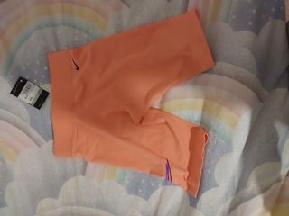 Mayas cortas Nike naranjas