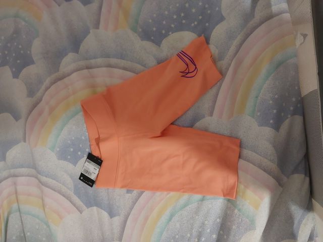 Mayas cortas Nike naranjas