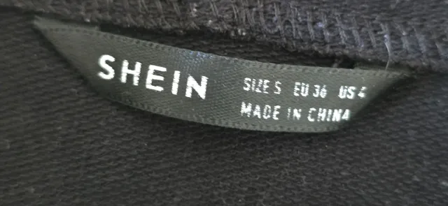 Sudadera negra con estampado de lunas