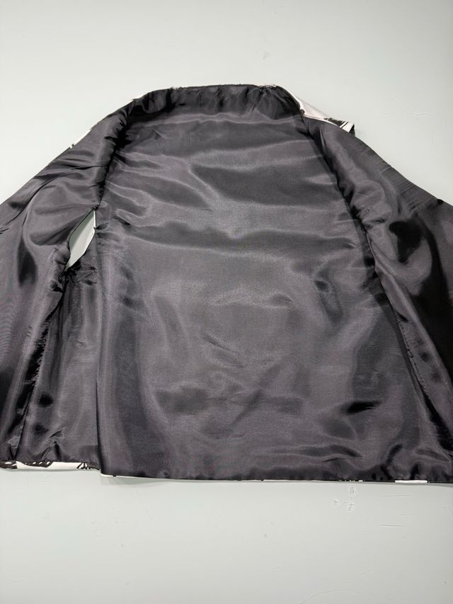 Chaleco estampado niño T4/5