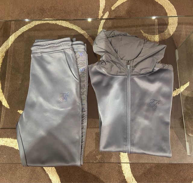 Chándal SikSilk grigio per bambino T13/14 in ottime condizioni