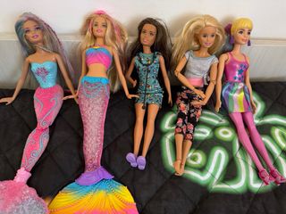 Set Barbie vario genere con moto