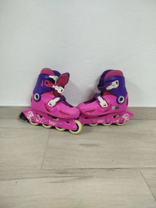 Patines en línea Oxelo rosas y morados.