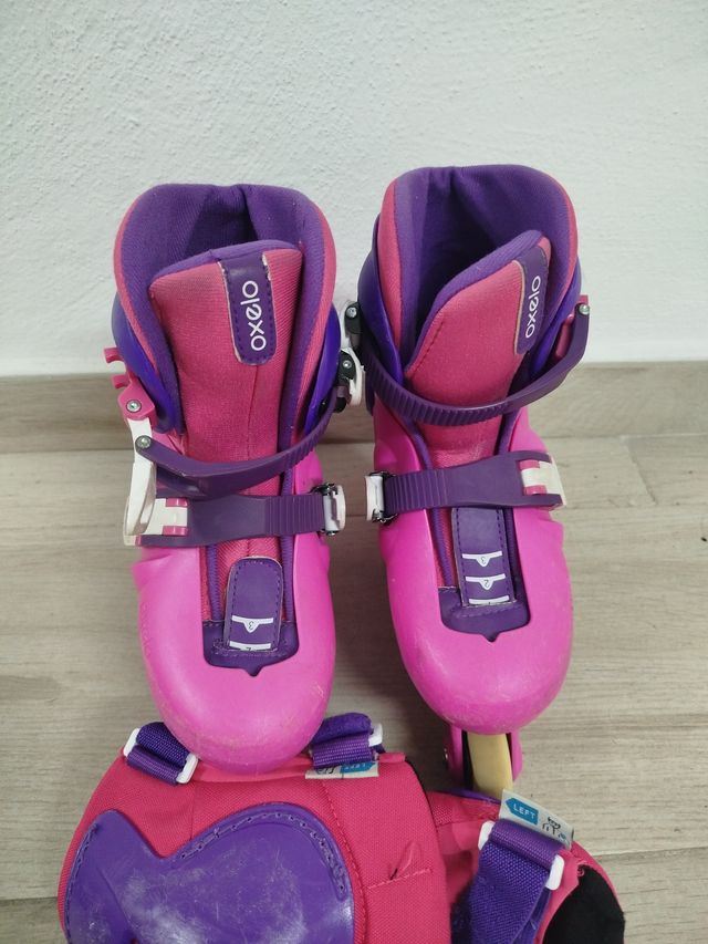 Patines en línea Oxelo rosas y morados.
