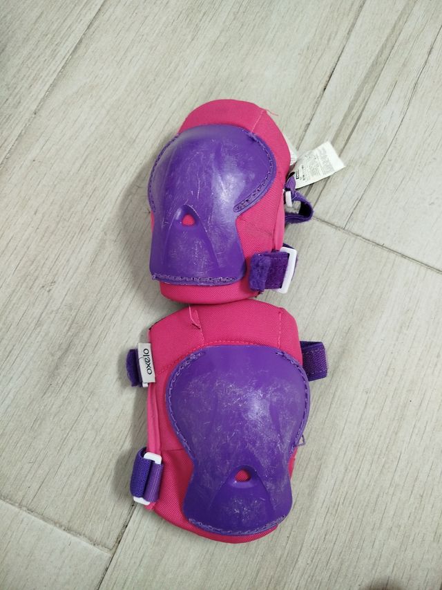 Patines en línea Oxelo rosas y morados.