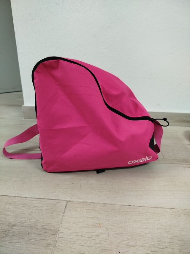 Patines en línea Oxelo rosas y morados.