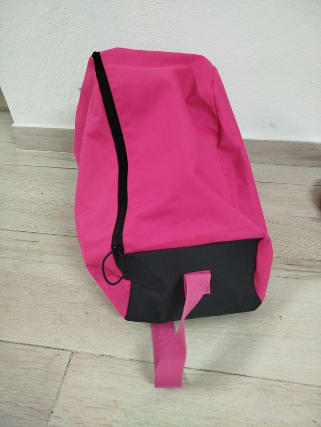 Patines en línea Oxelo rosas y morados.