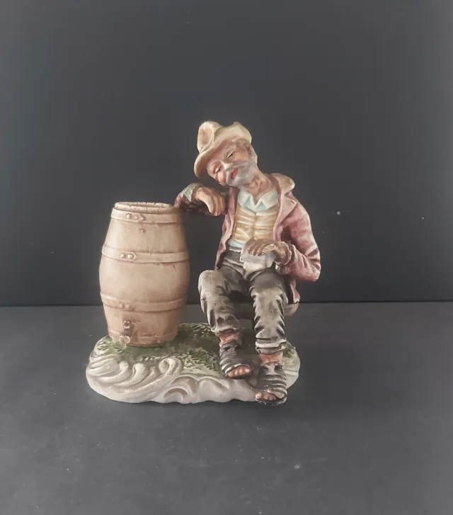 Figura del vagabondo con barile