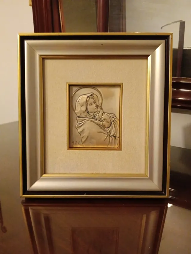 Virgenes con Niño en Plata de Ley.