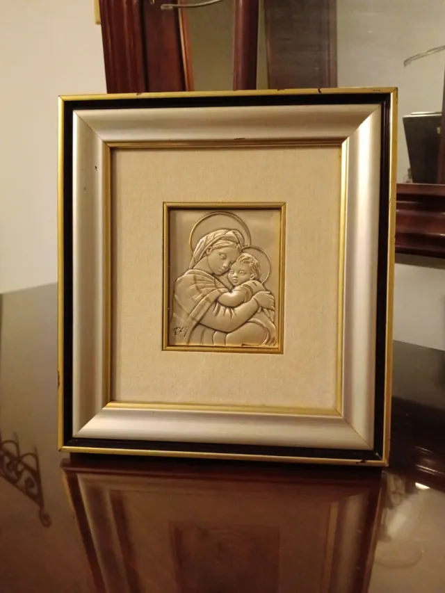 Virgenes con Niño en Plata de Ley.