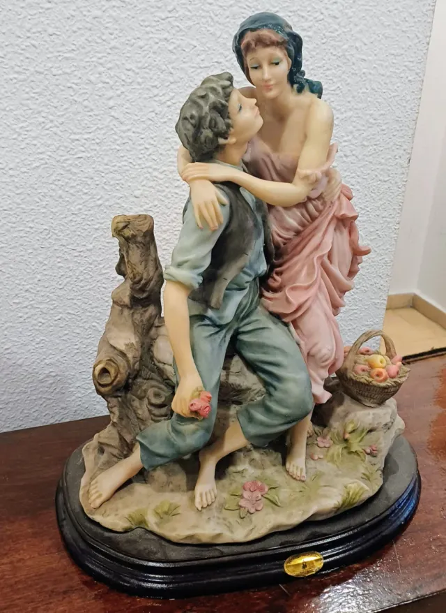 Figura vintage cerámica y madera pareja