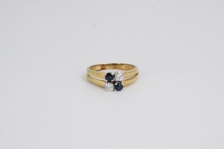 049-01-00071 Anillo oro 18K diamante y piedra azul