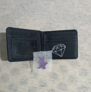 Cartera Spyro + Pin Spyro. Como Nuevo.